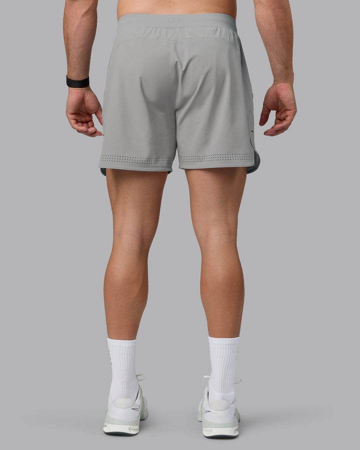 Man wearing Lift 6&quot; Lined Performance Shorts - Circular Grey
