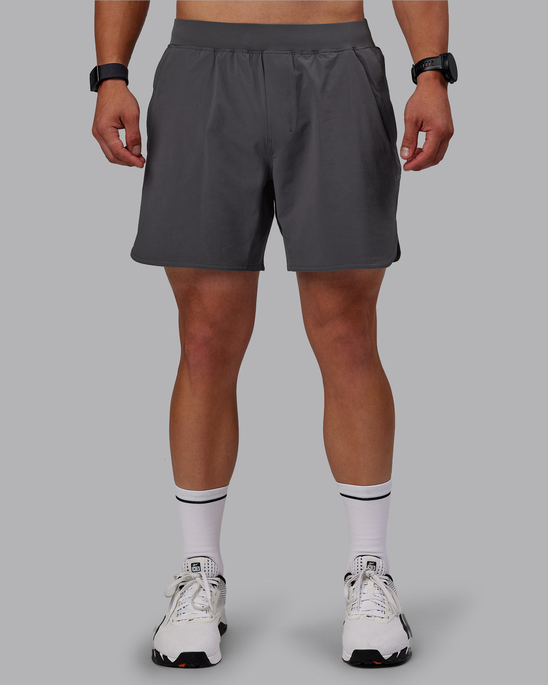 Man wearing Lift 6&quot; Lined Performance Shorts - Dark Storm