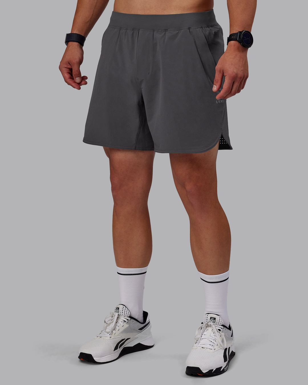 Man wearing Lift 6&quot; Lined Performance Shorts - Dark Storm