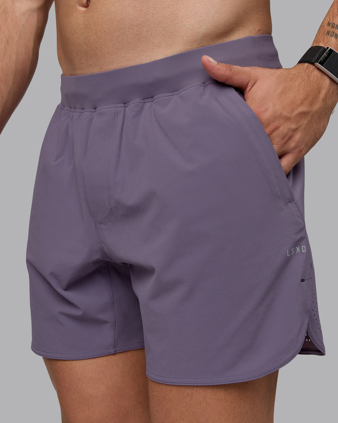 Man wearing Lift 6&quot; Lined Performance Shorts - Purple Sage