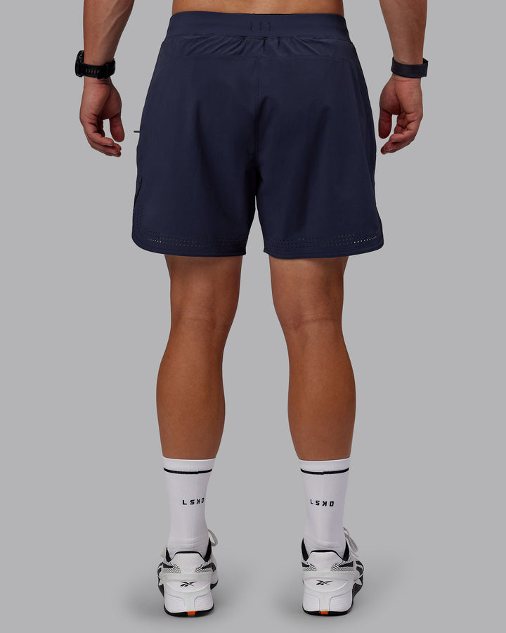 Man wearing Lift 6&quot; Performance Shorts - Future Navy
