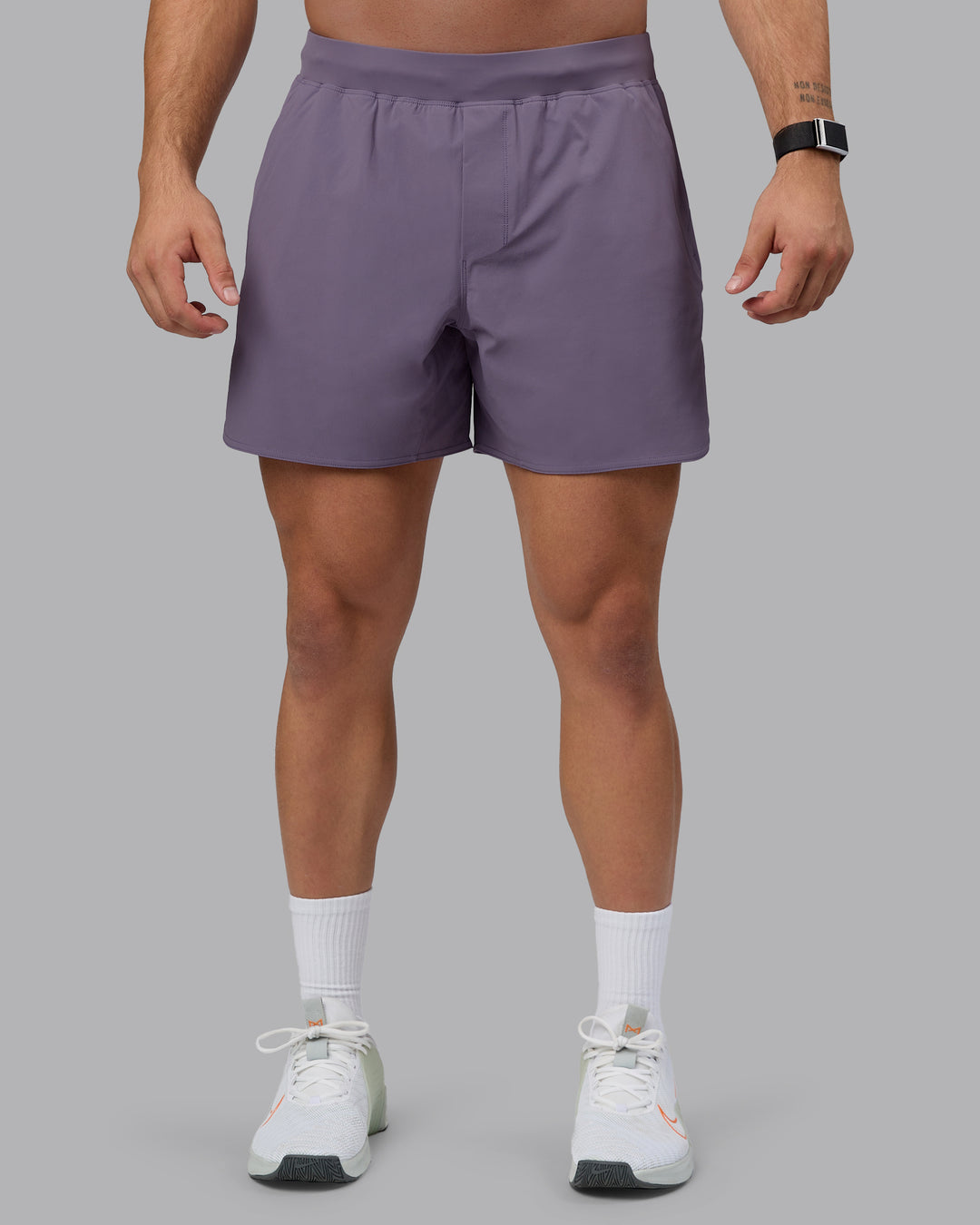 Man wearing Lift 6&quot; Performance Shorts - Purple Sage