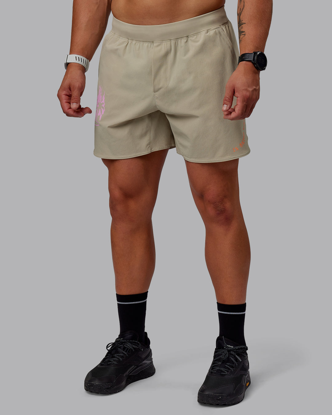 Man wearing Lift 6&quot; Performance Shorts - Sand-So Cal 24