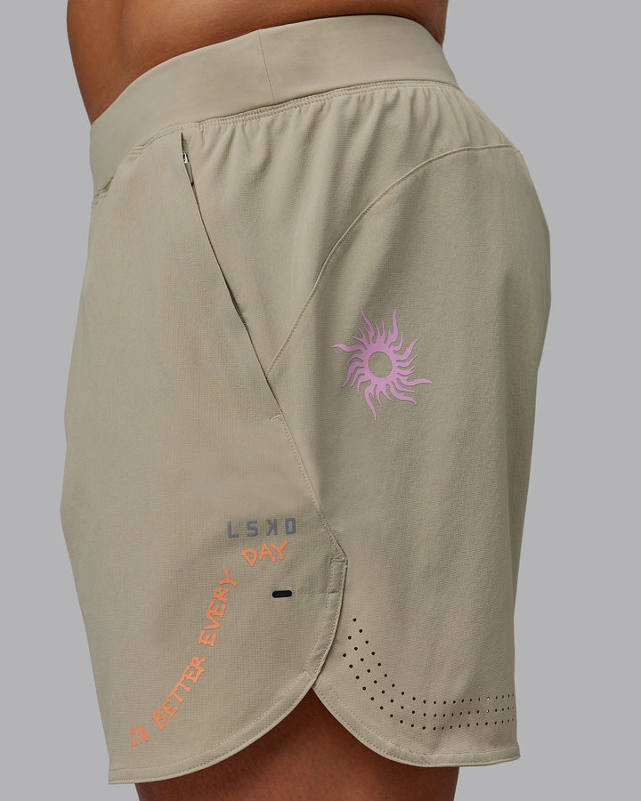 Man wearing Lift 6&quot; Performance Shorts - Sand-So Cal 24
