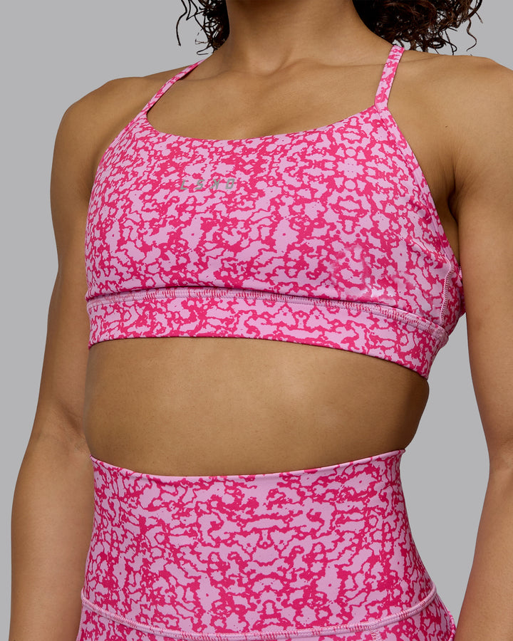 Woman wearing Lift Sports Bra - Patina-Ultra Pink
