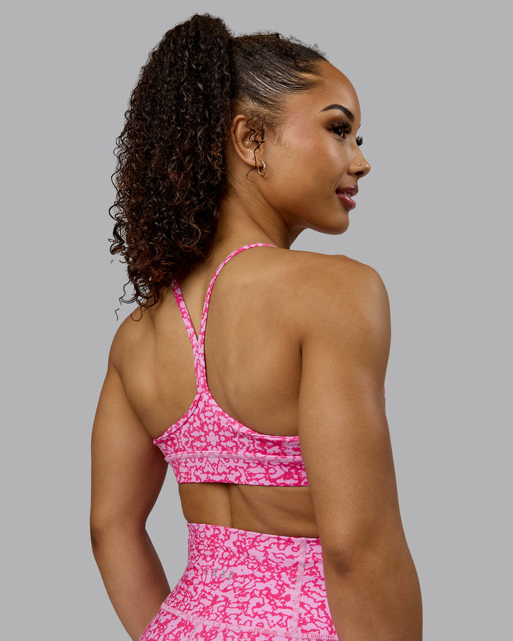 Woman wearing Lift Sports Bra - Patina-Ultra Pink
