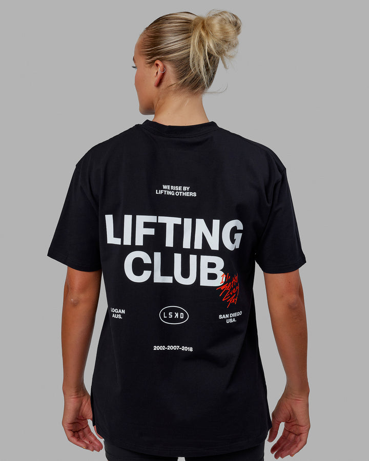 Woman wearing Unisex Lifting Club FLXCotton Tee Oversize - Black-White-Red
