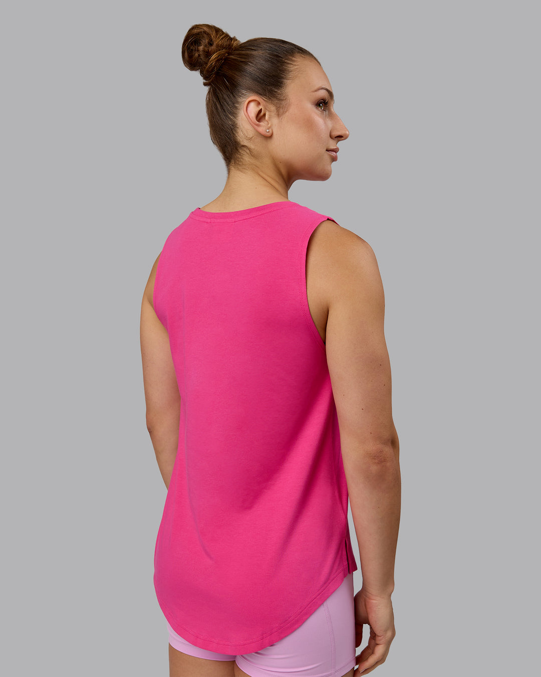 Woman wearing Luna FLXCotton Longline Tank - Ultra Pink-White