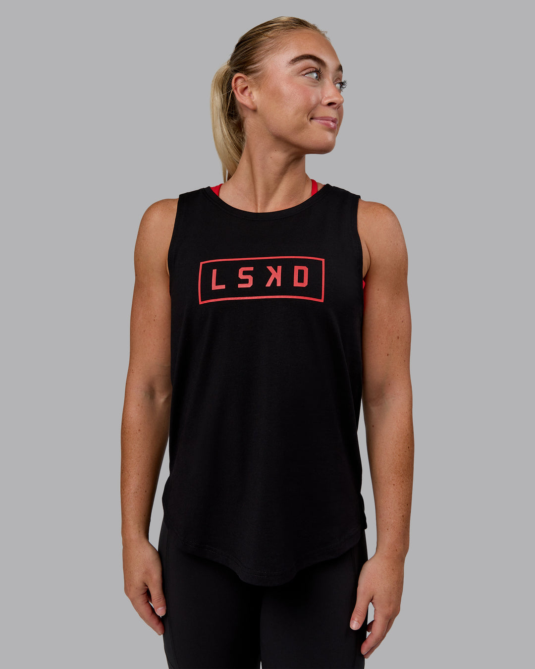 Woman wearing Luna FLXCotton Longline Tank - Black-Crimson