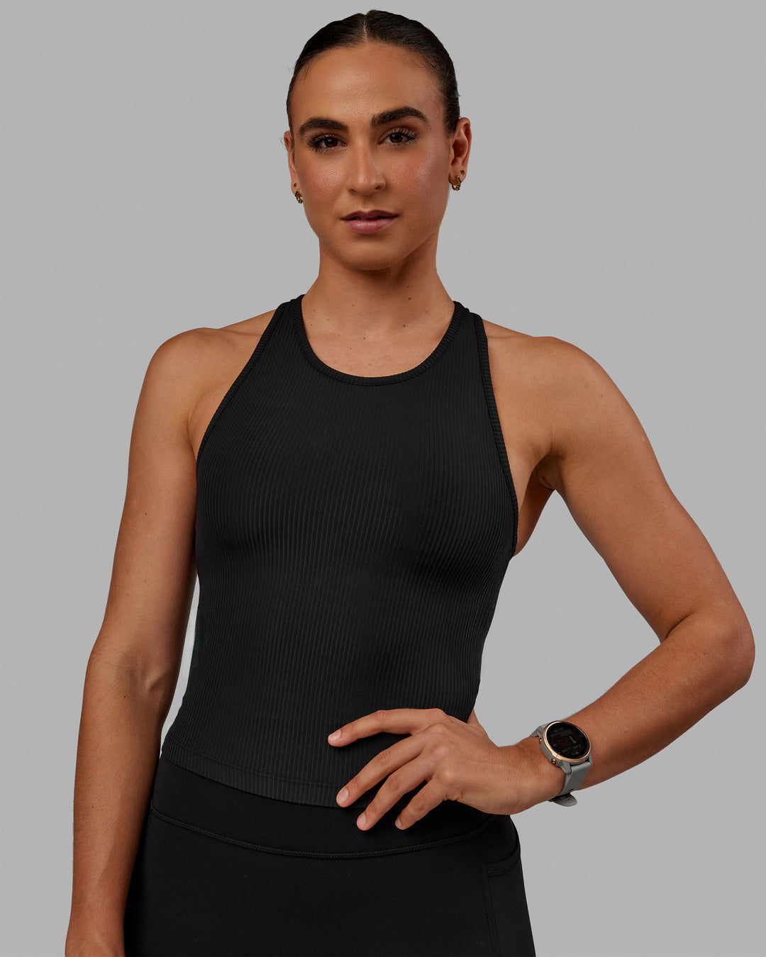 Woman wearing Luxe Ribbed Flow Shelf Bra Performance Tank - Black