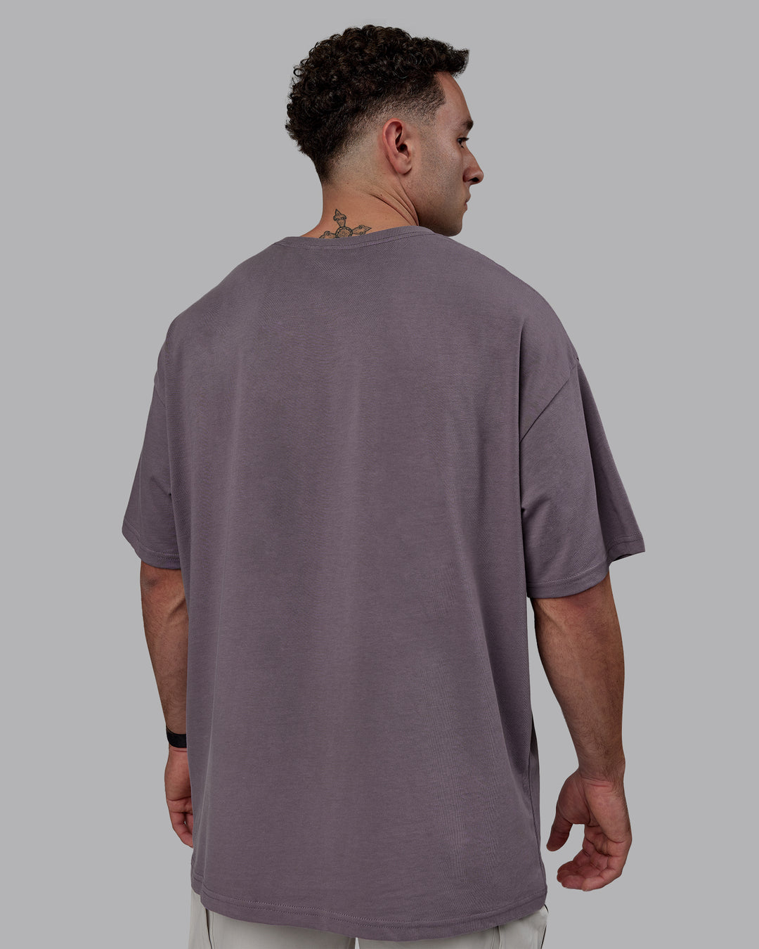 Man wearing MVP Heavyweight Tee Oversize - Purple Sage