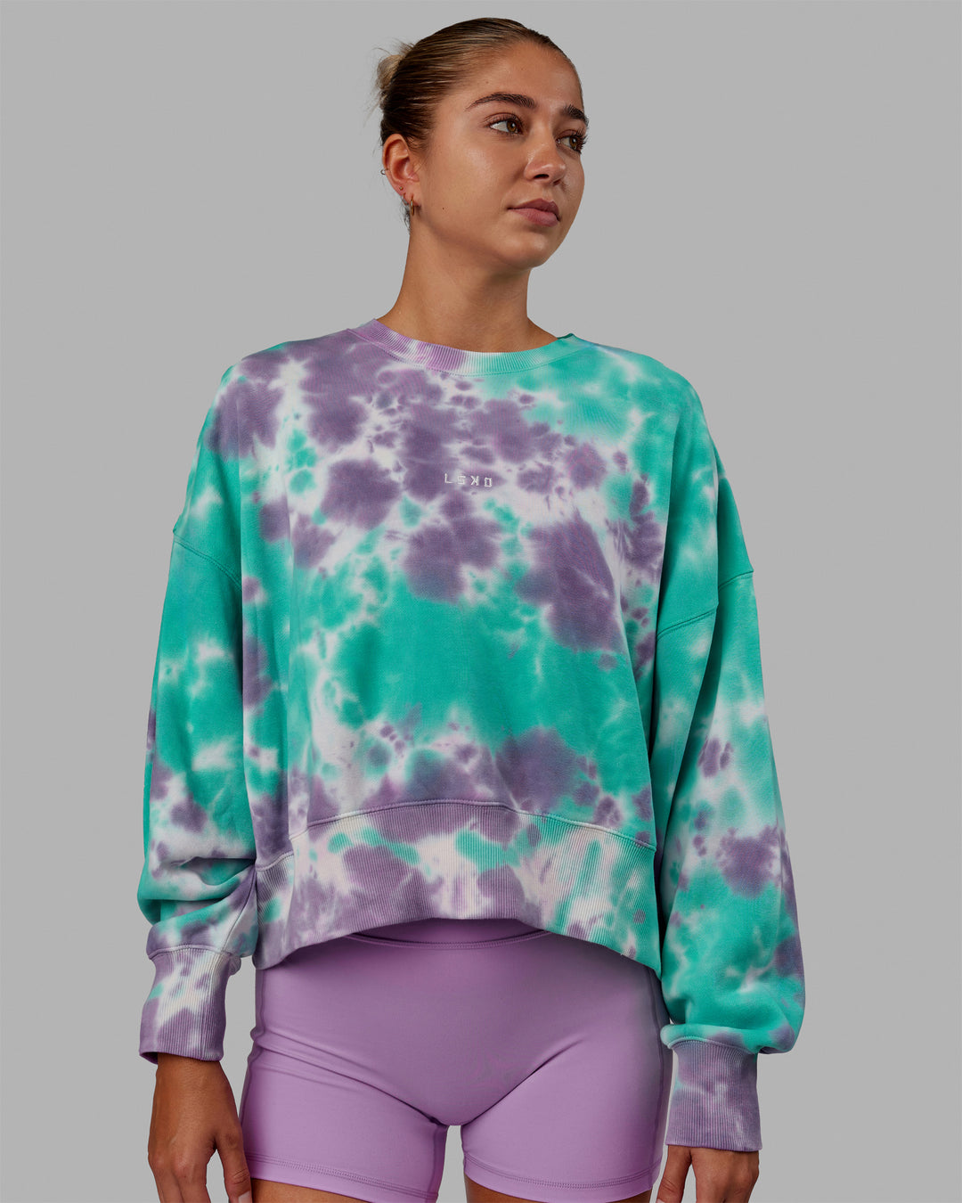 Woman wearing MVP Oversized Sweater - Cockatoo-Tie Dye