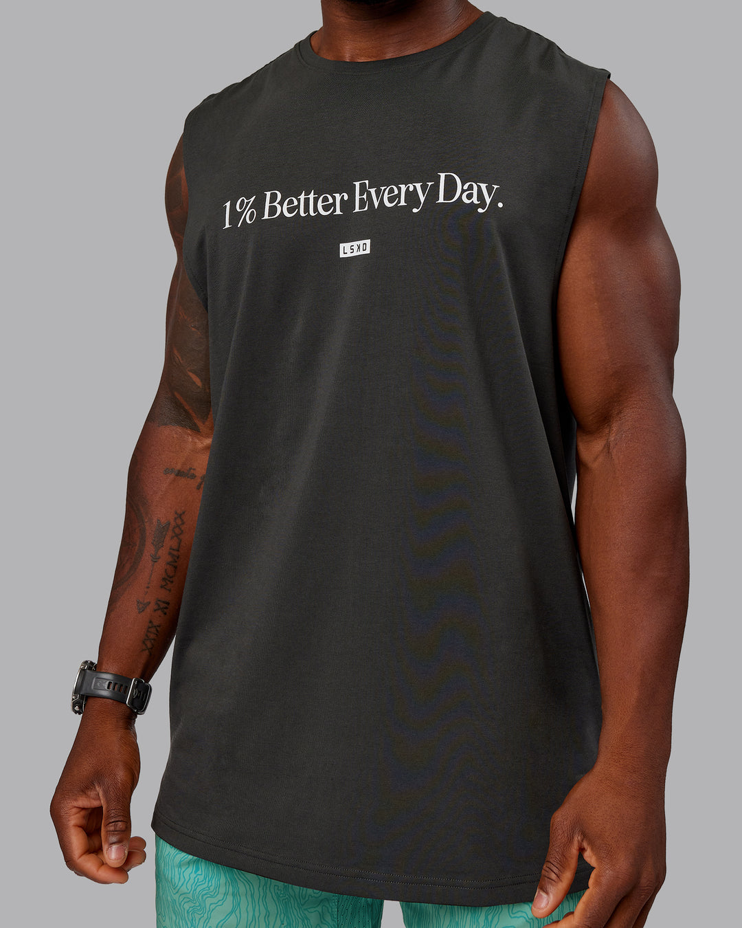 Man wearing 1% Better FLXCotton Training Fit Tank - Pirate Black