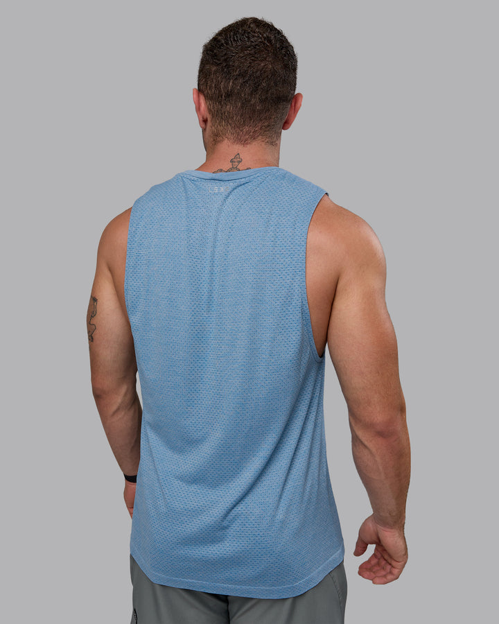 Man wearing AeroFLX+ Seamless Muscle Tank - Elemental Blue/Ice Blue
