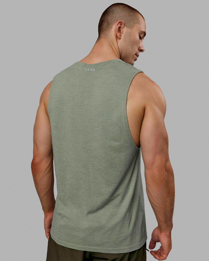 Man wearing AeroFLX+ Seamless Muscle Tank - Iceberg Green Marl
