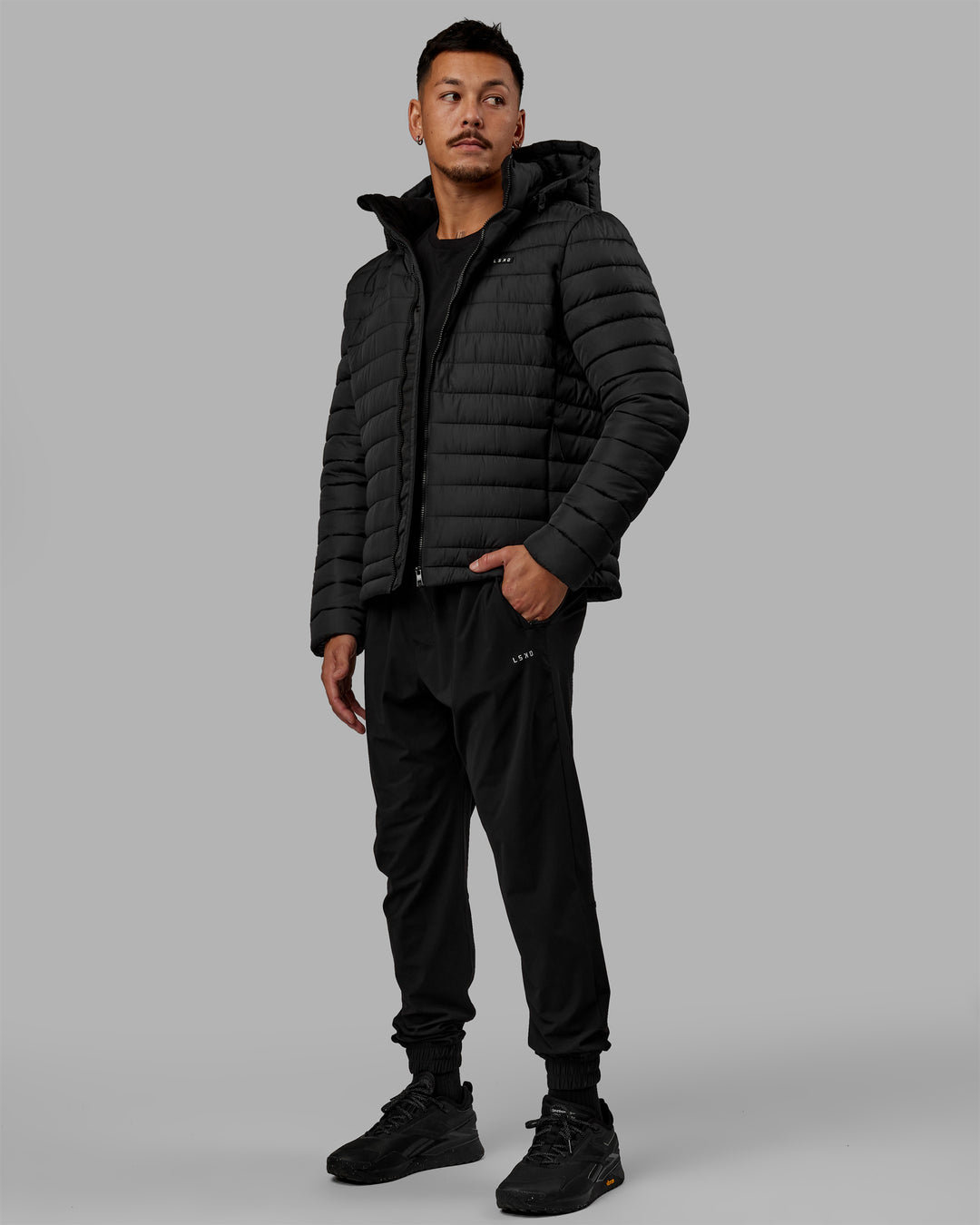 Man wearing All-day Puffer Jacket - Black