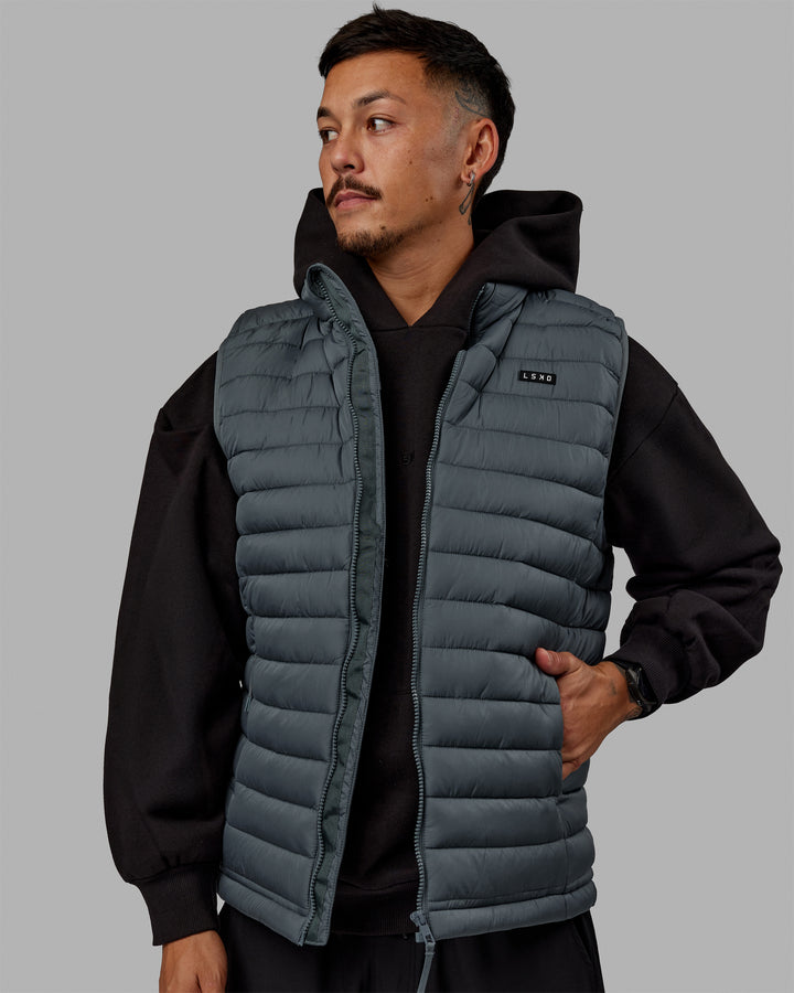 Man wearing All Day Puffer Vest - Storm
