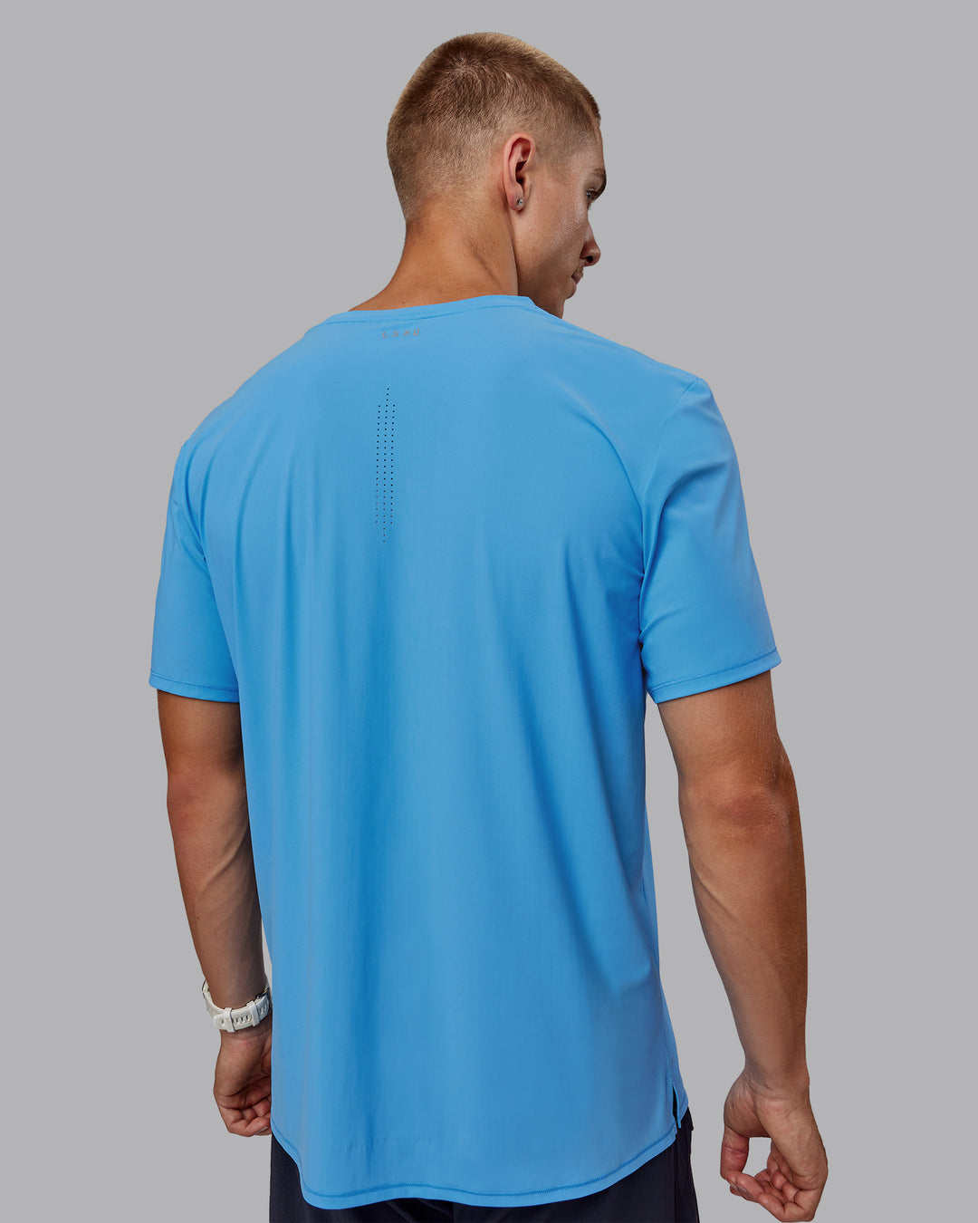 Man wearing Cadence Tee - Azure Blue