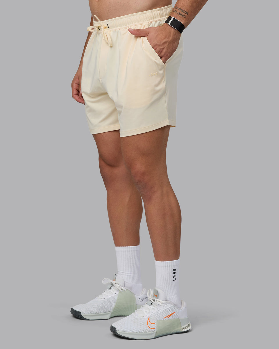 Man wearing Restore 6" CloudFLX Shorts - Ivory