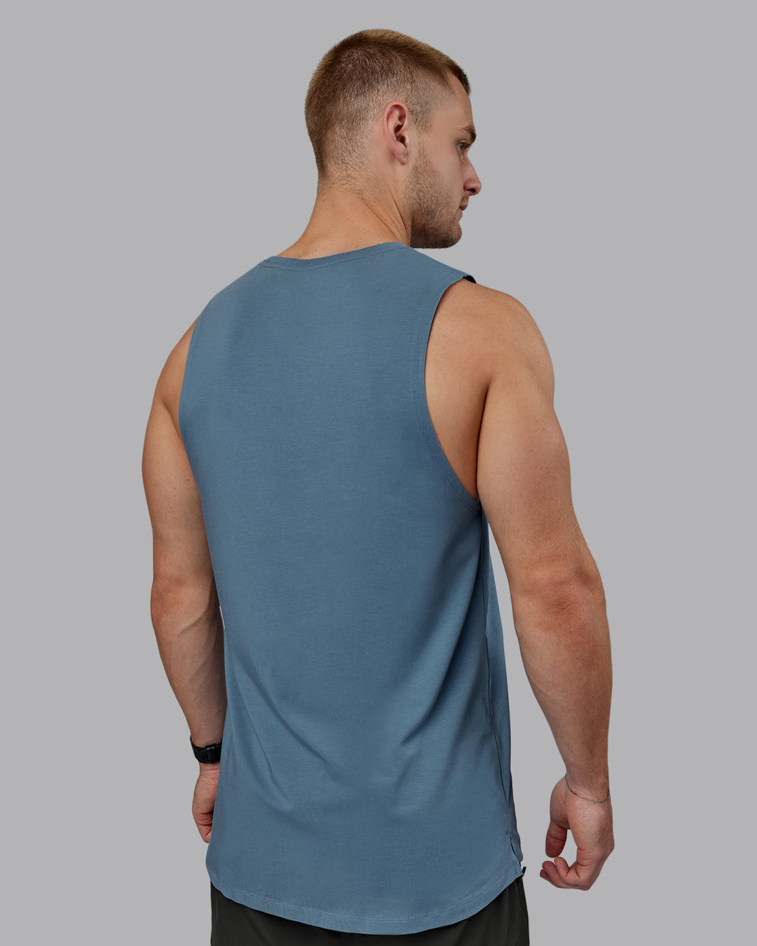 Man wearing Deluxe PimaFLX Tank - Elemental Blue