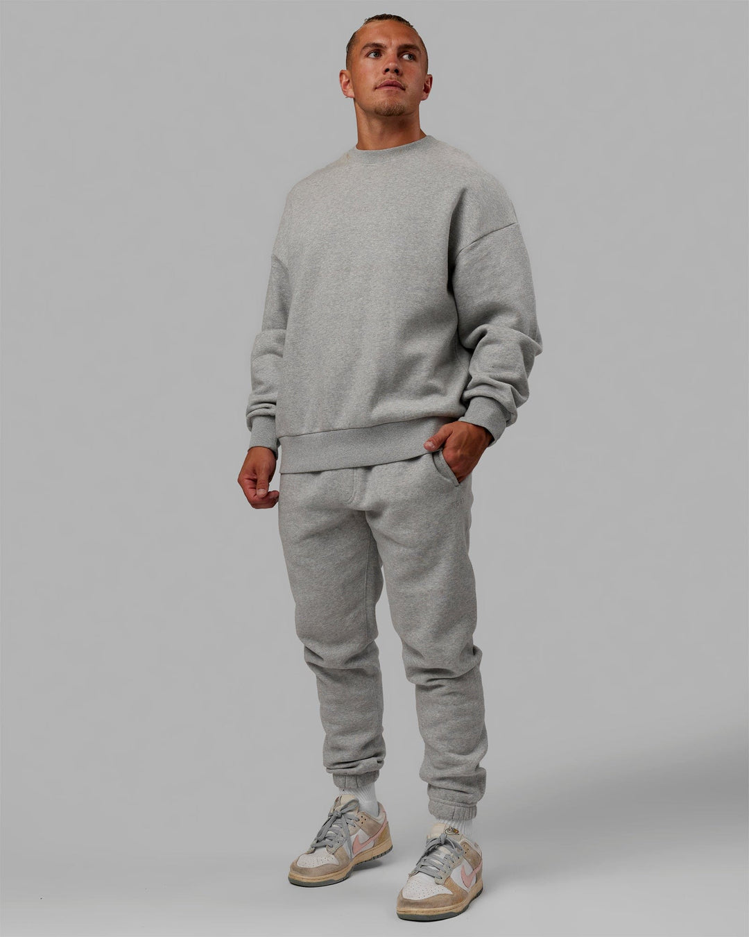 Man wearing MVP Track Pants - Lt Grey Marl