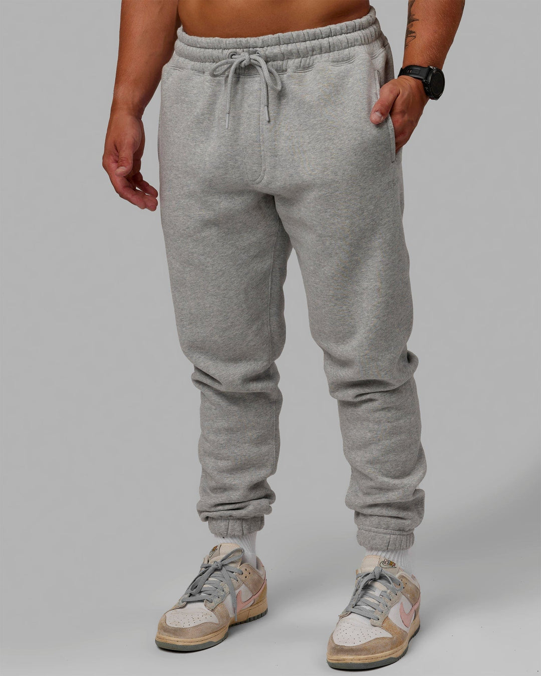 Man wearing MVP Track Pants - Lt Grey Marl