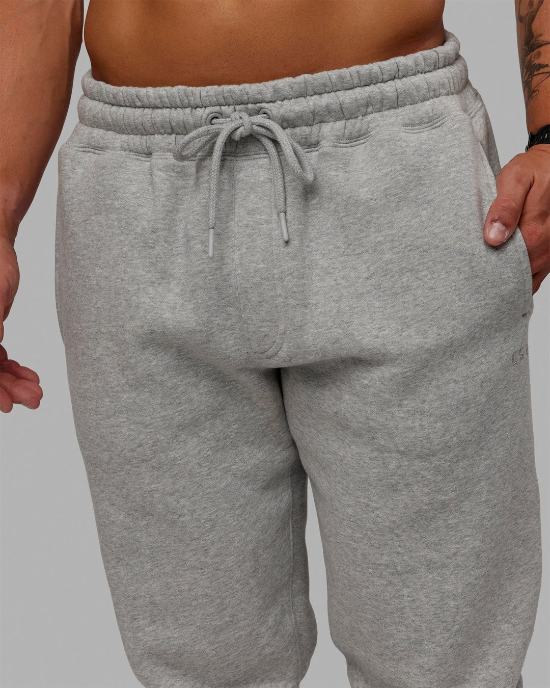 Man wearing MVP Track Pants - Lt Grey Marl