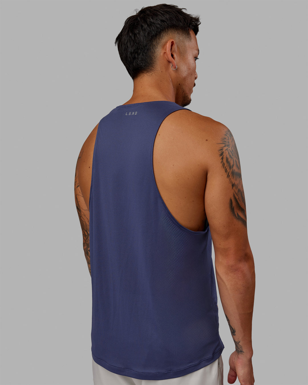 Man Wearing Pace Running Tank - Future Dusk