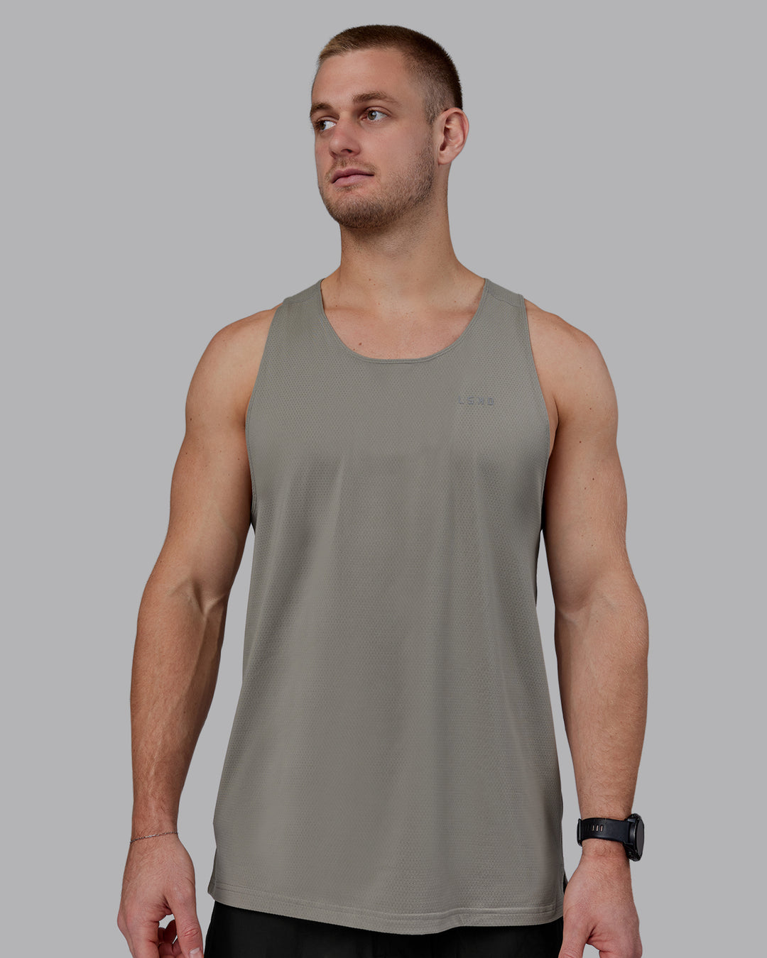 Man wearing Perform VapourFLX Tank - Elephant