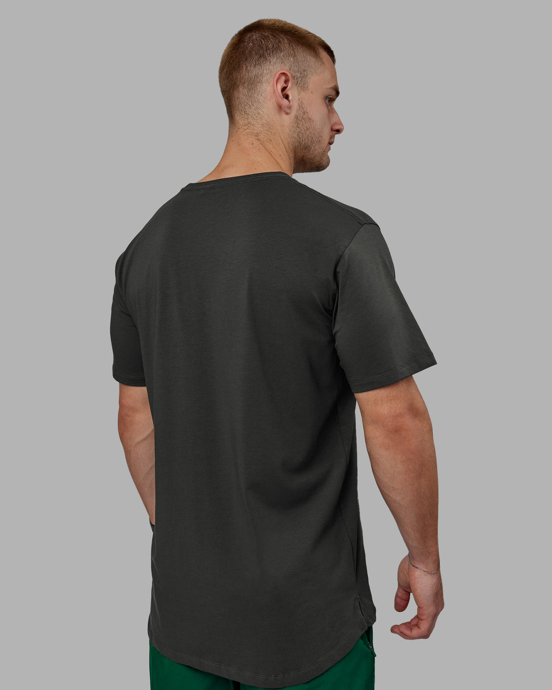 Man wearing Deluxe PimaFLX Tee - Pirate Black