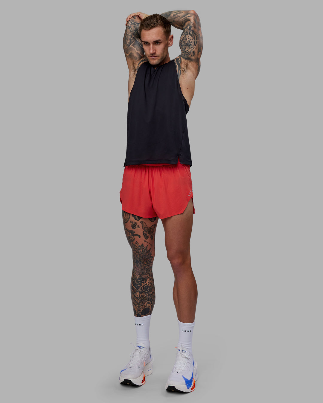 Man wearing Race Day 3&quot; Lined Running Shorts - Cayenne