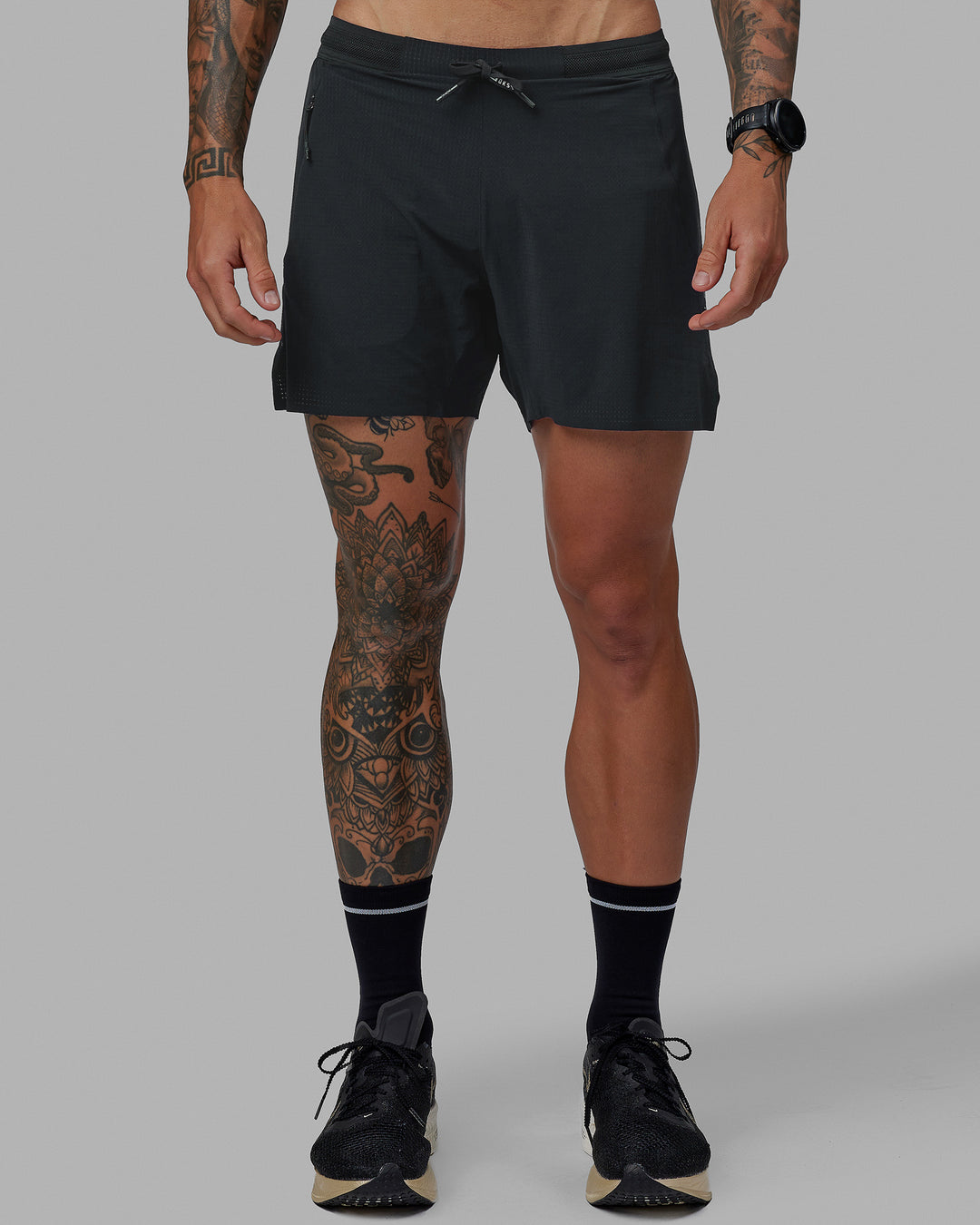 Man wearing UltraAir 5&quot; Lined Performance Shorts - Pirate Black