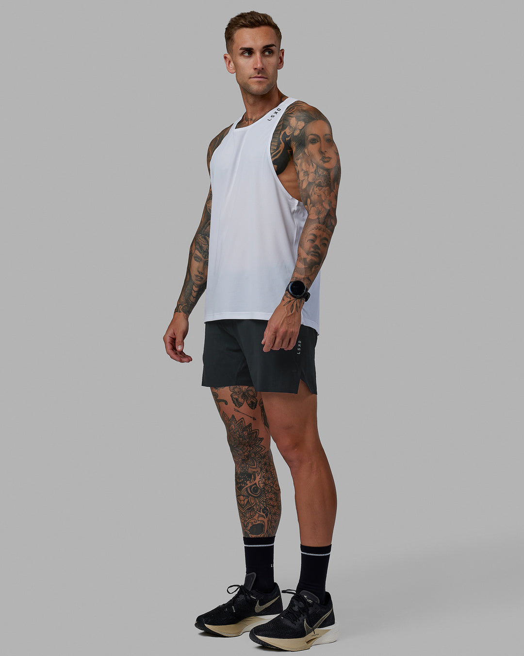 Man wearing UltraAir 5&quot; Lined Performance Shorts - Pirate Black