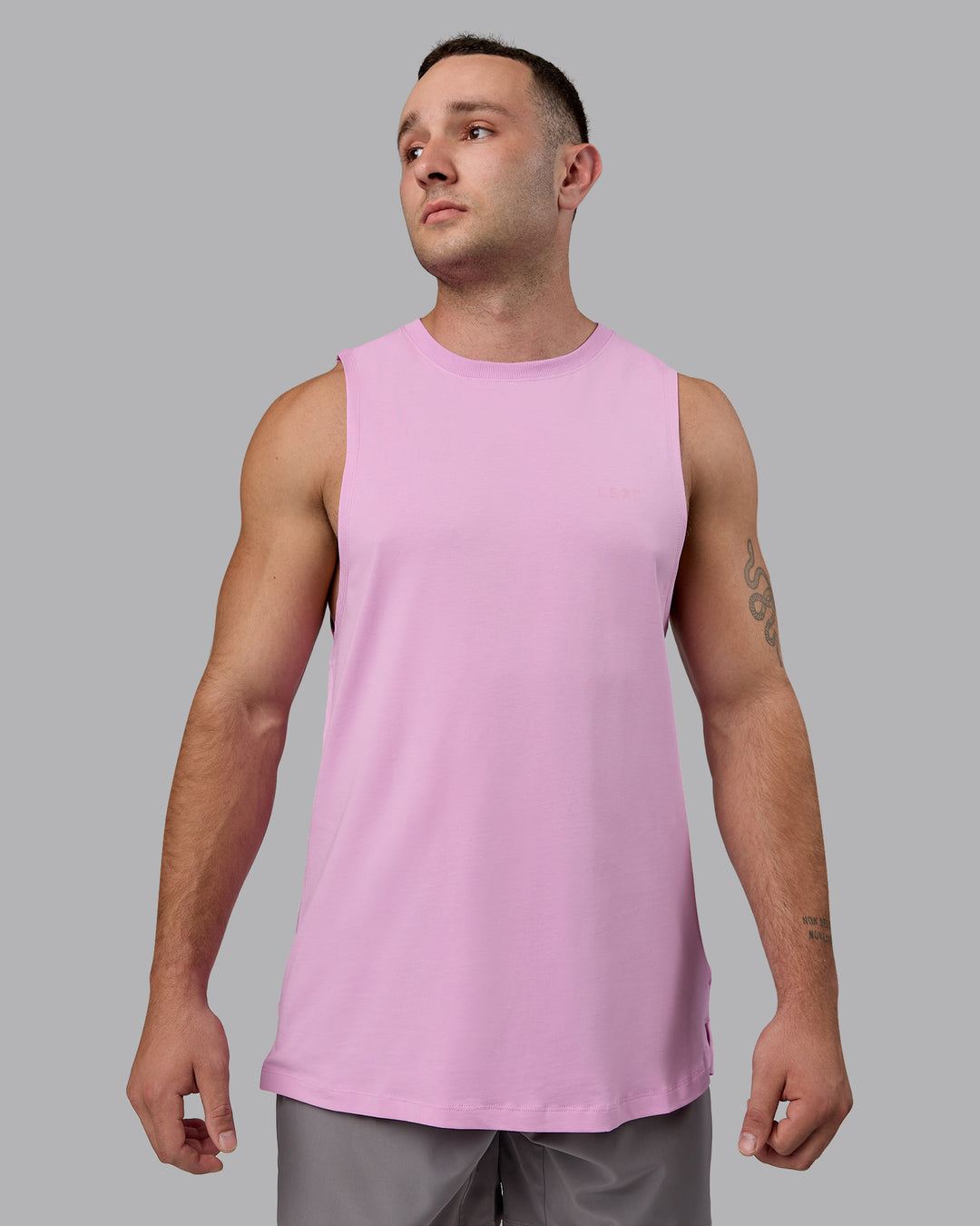 Man wearing Deluxe PimaFLX Tank - Pastel Orchid