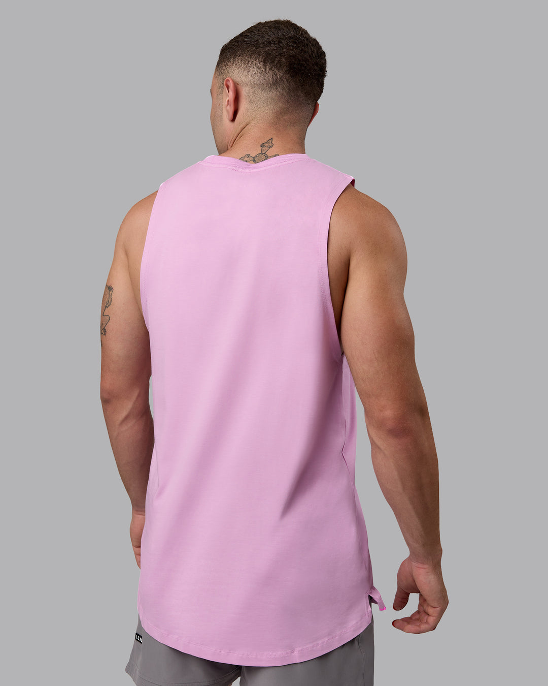 Man wearing Deluxe PimaFLX Tank - Pastel Orchid