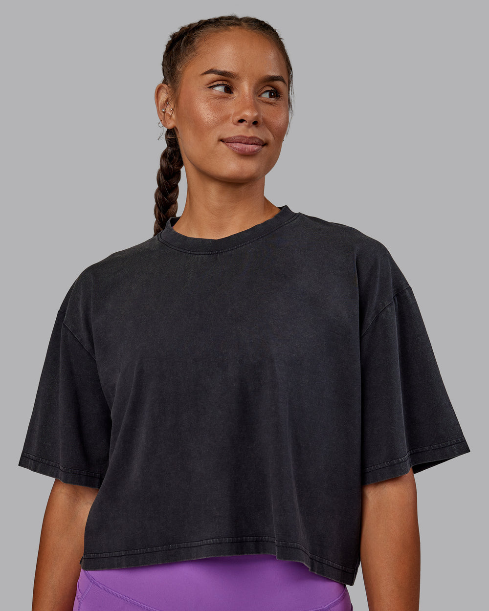 Woman wearing Miami 2025 FLXCotton Cropped Tee - Black-Purple Swirl