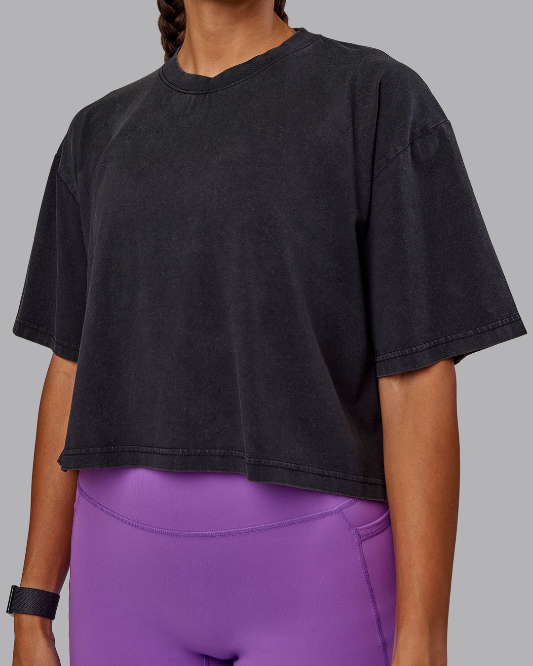 Woman wearing Miami 2025 FLXCotton Cropped Tee - Black-Purple Swirl