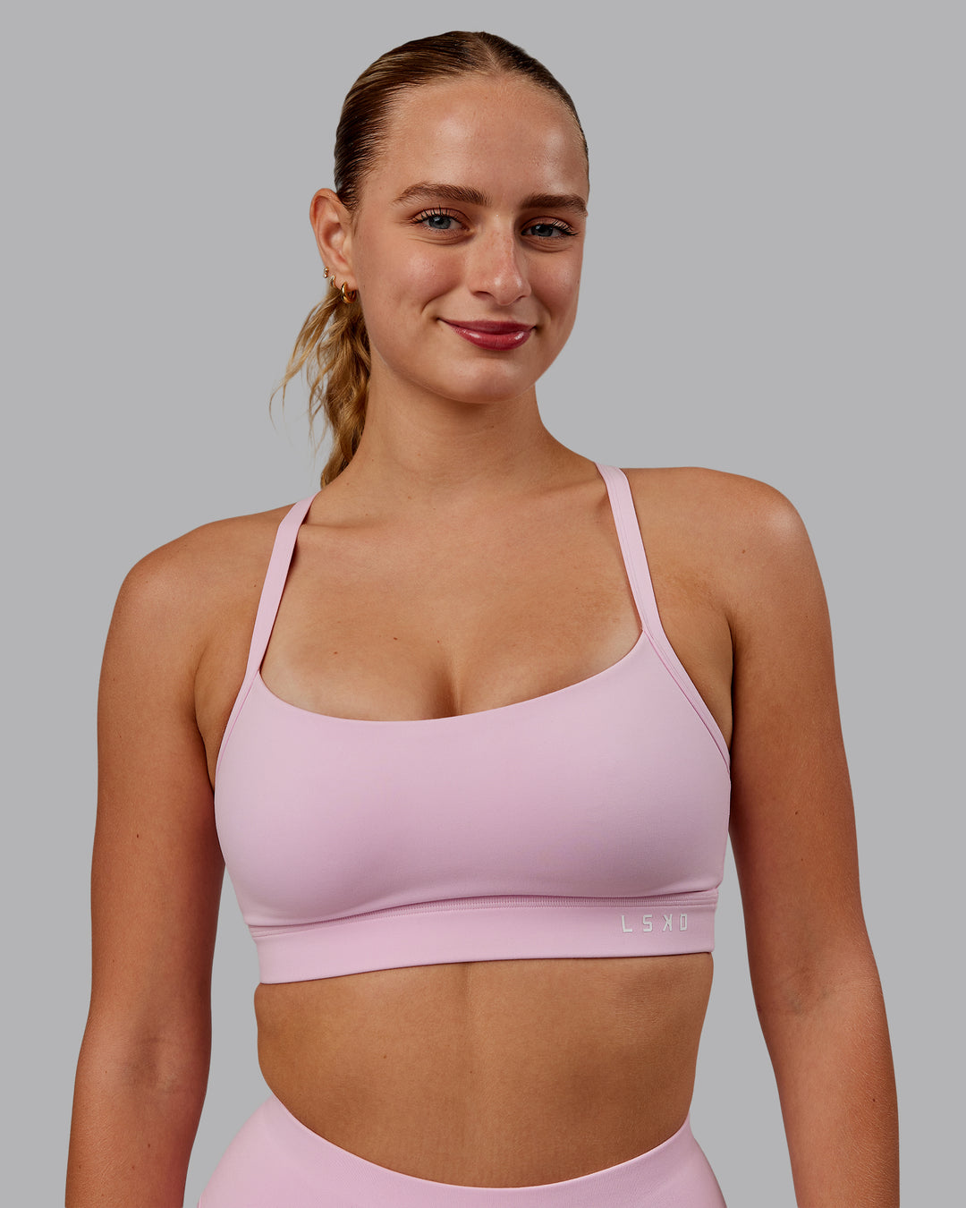 Woman wearing Momentum Sports Bra D/DD/E - Marshmallow