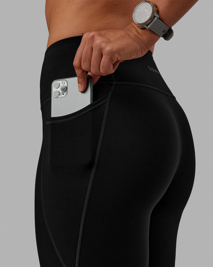 Woman wearing Motion Full Length Thermal Leggings - Black
