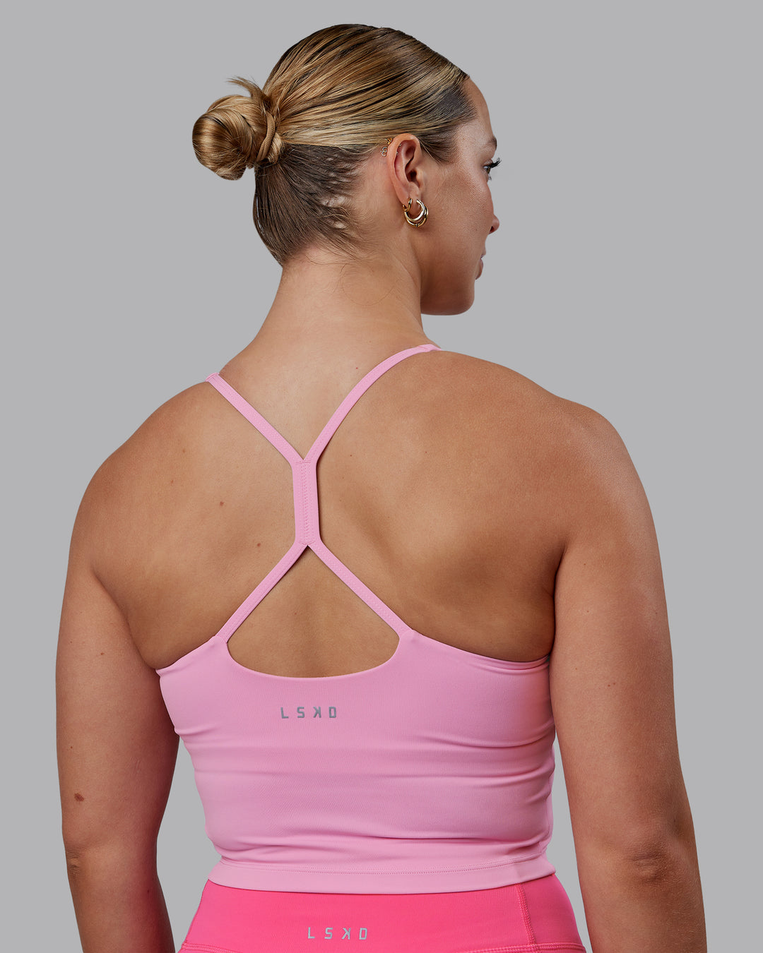 Woman wearing Movement Active Tank - Bubblegum