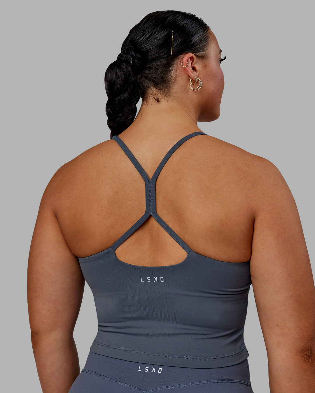 Woman wearing Movement Active Tank - Turbulence