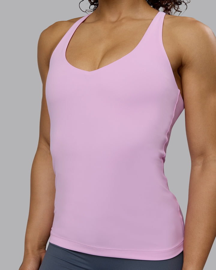 Woman wearing Movement Longline Active Shelf Bra Tank - Pastel Orchid
