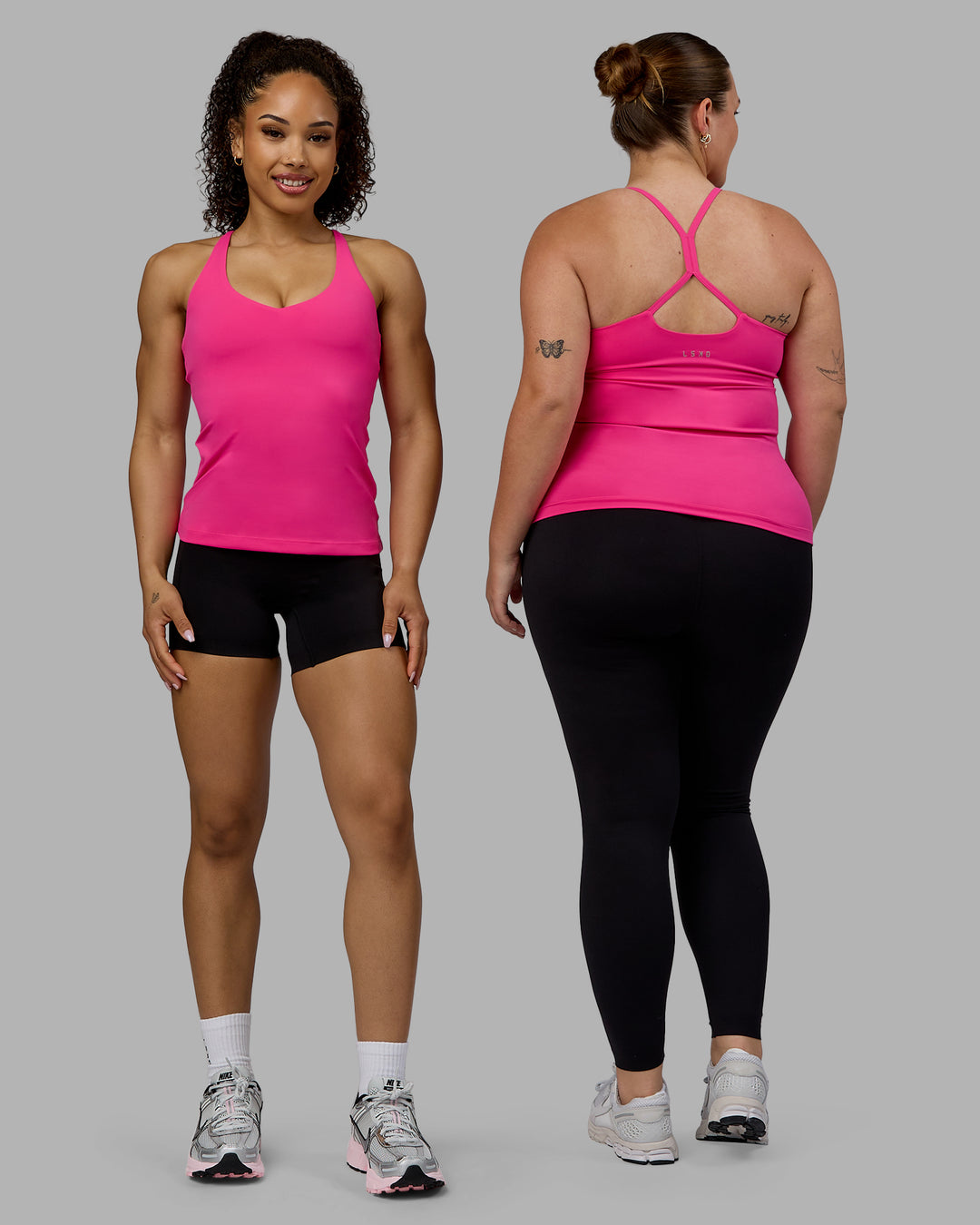 Woman wearing Movement Longline Active Shelf Bra Tank - Ultra Pink