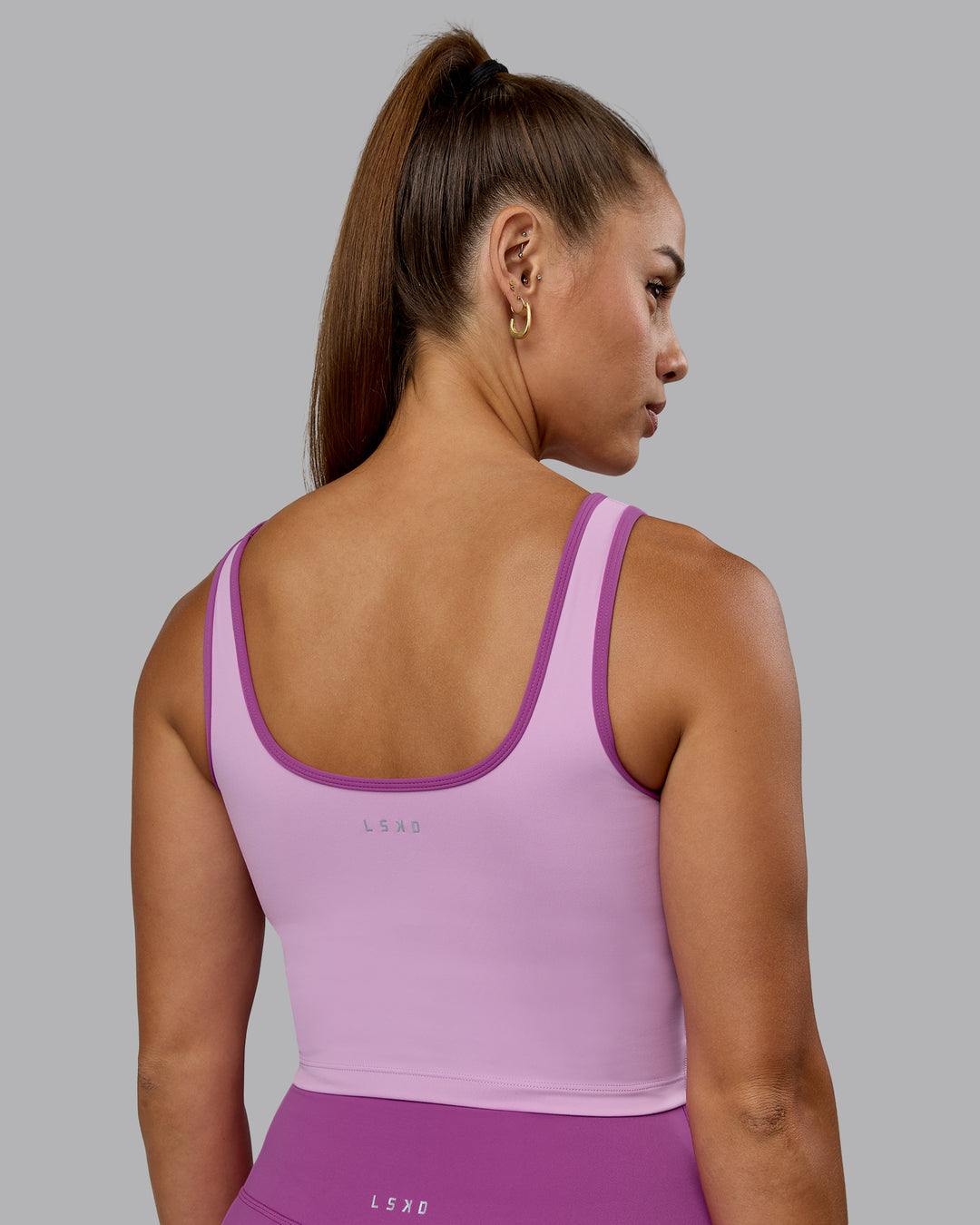 Woman wearing Nexus Active Tank - Light Violet-Orchid