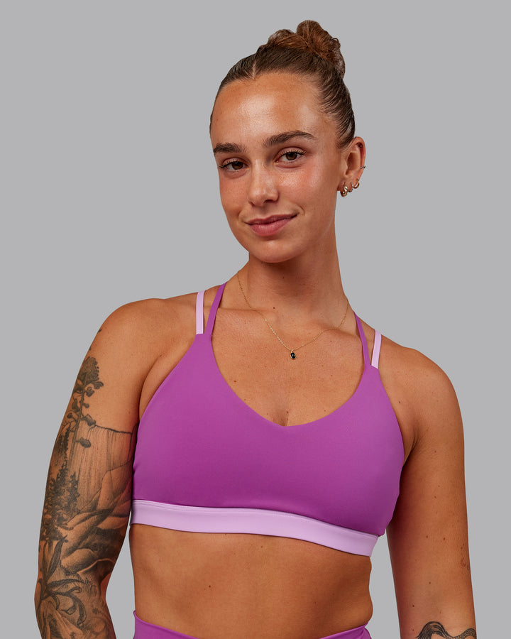 Woman wearing Nexus Sports Bra - Orchid
