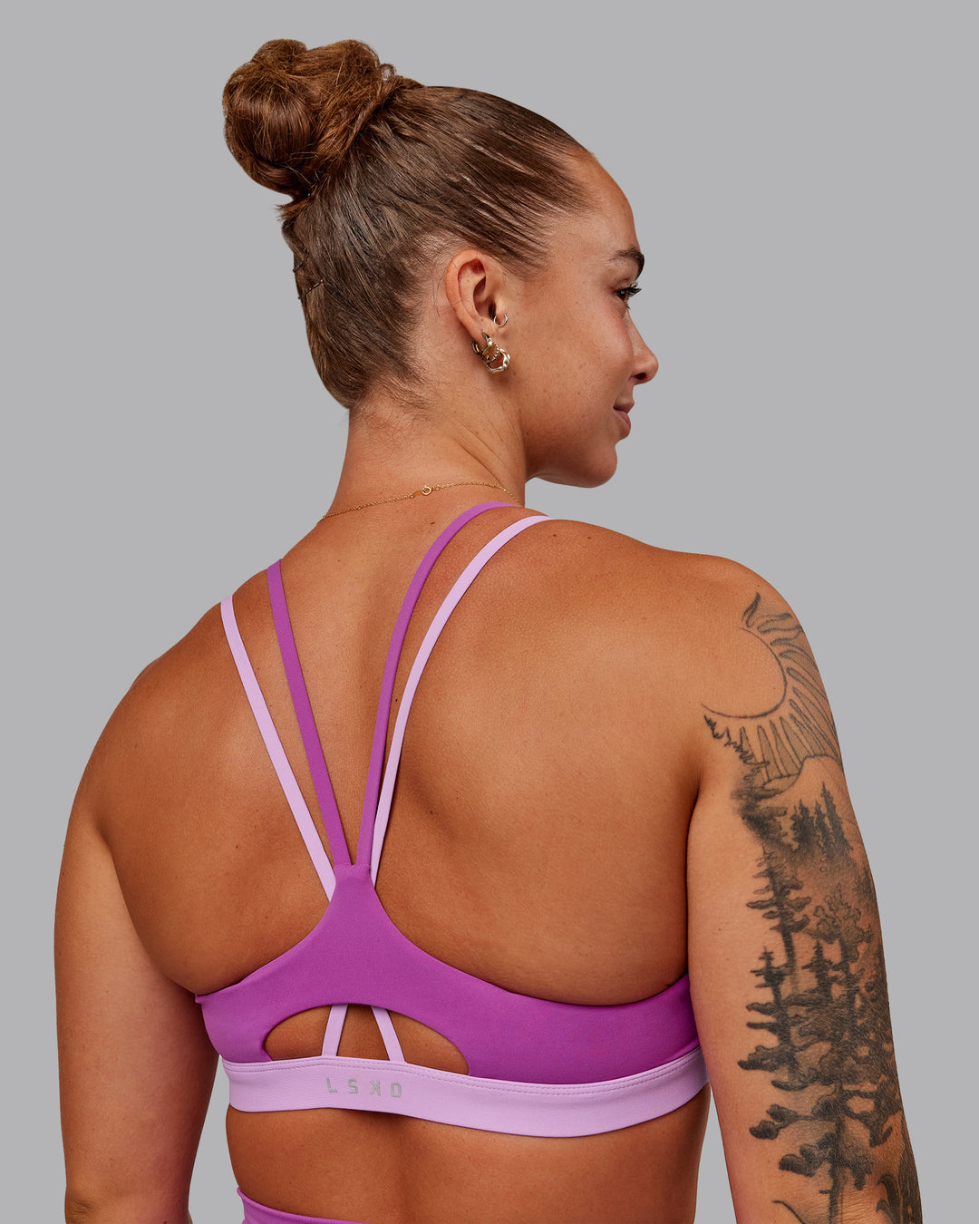 Woman wearing Nexus Sports Bra - Orchid