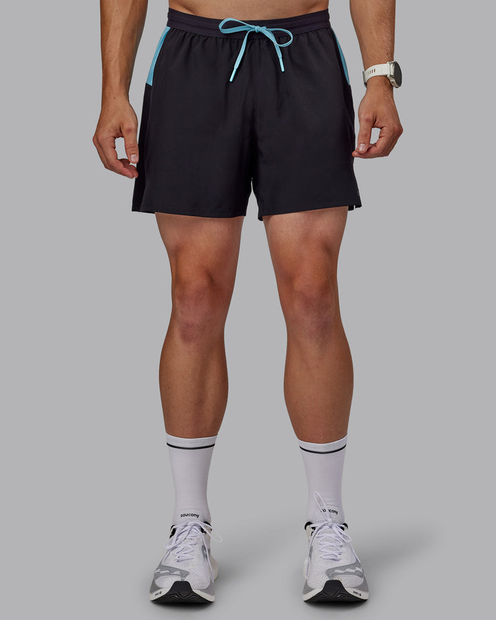 Man wearing Pace 5&quot; Lined Performance Shorts - Black-Retro Blue
