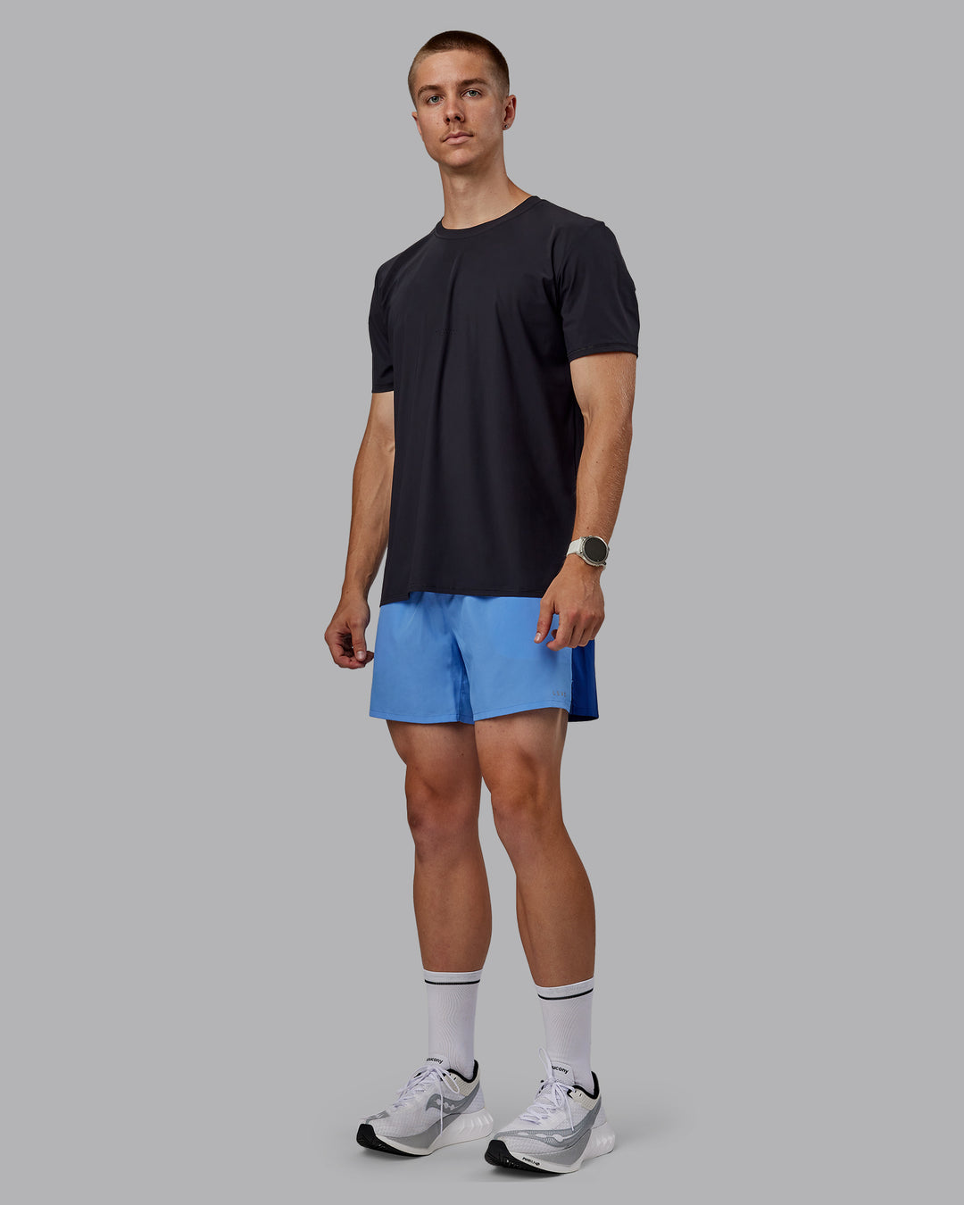 Man wearing Pace 5&quot; Lined Performance Shorts - Midnight Blue-Ultramarine