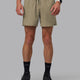 Man wearing Pace 5" Lined Performance Shorts - Elephant