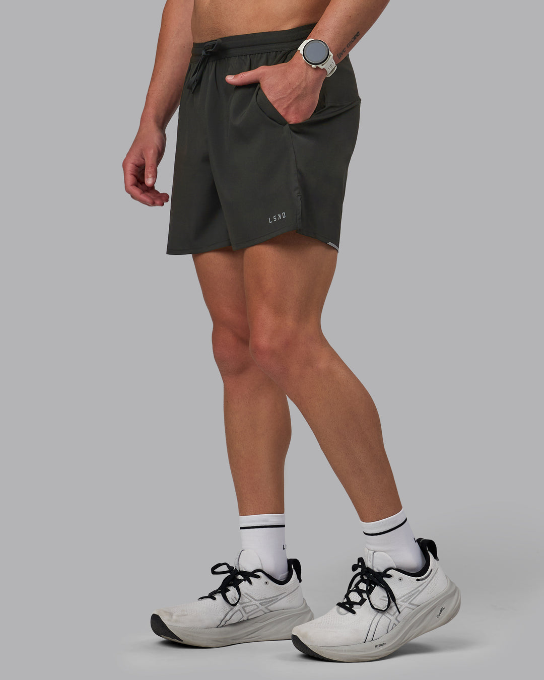 Man wearing Pace 5&quot; Lined Performance Shorts - Pirate Black